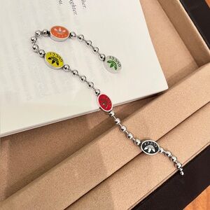 Gucci Silver Bracelet with Colorful Logo Charms
